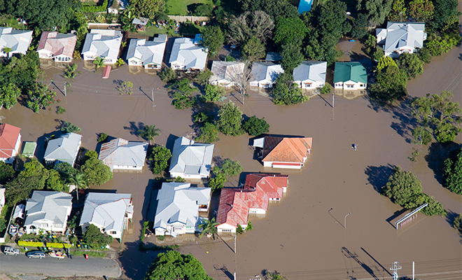 Flooded houses Climate Change Disaster Preparedness Leadership