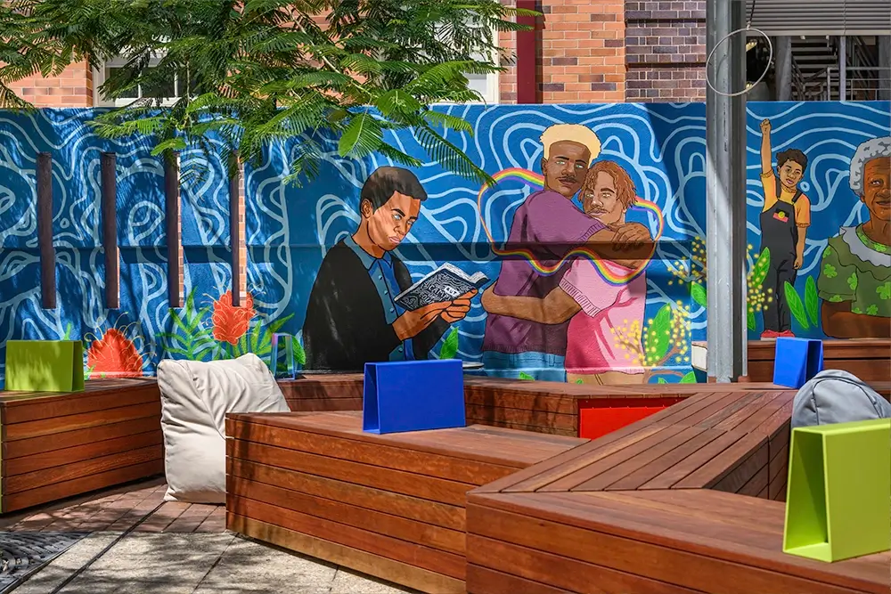 indigenous art on a wall in a garden